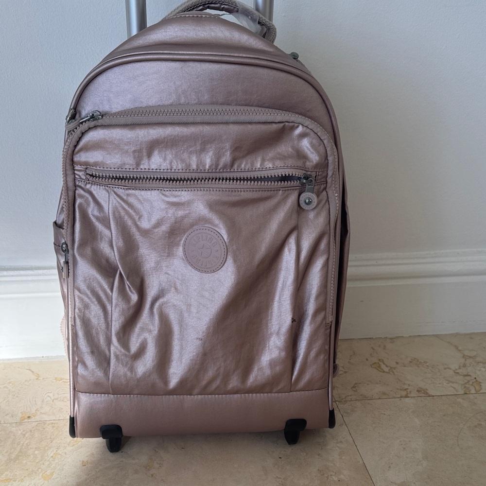 Kipling Shimmering Pink Rolling Backpack